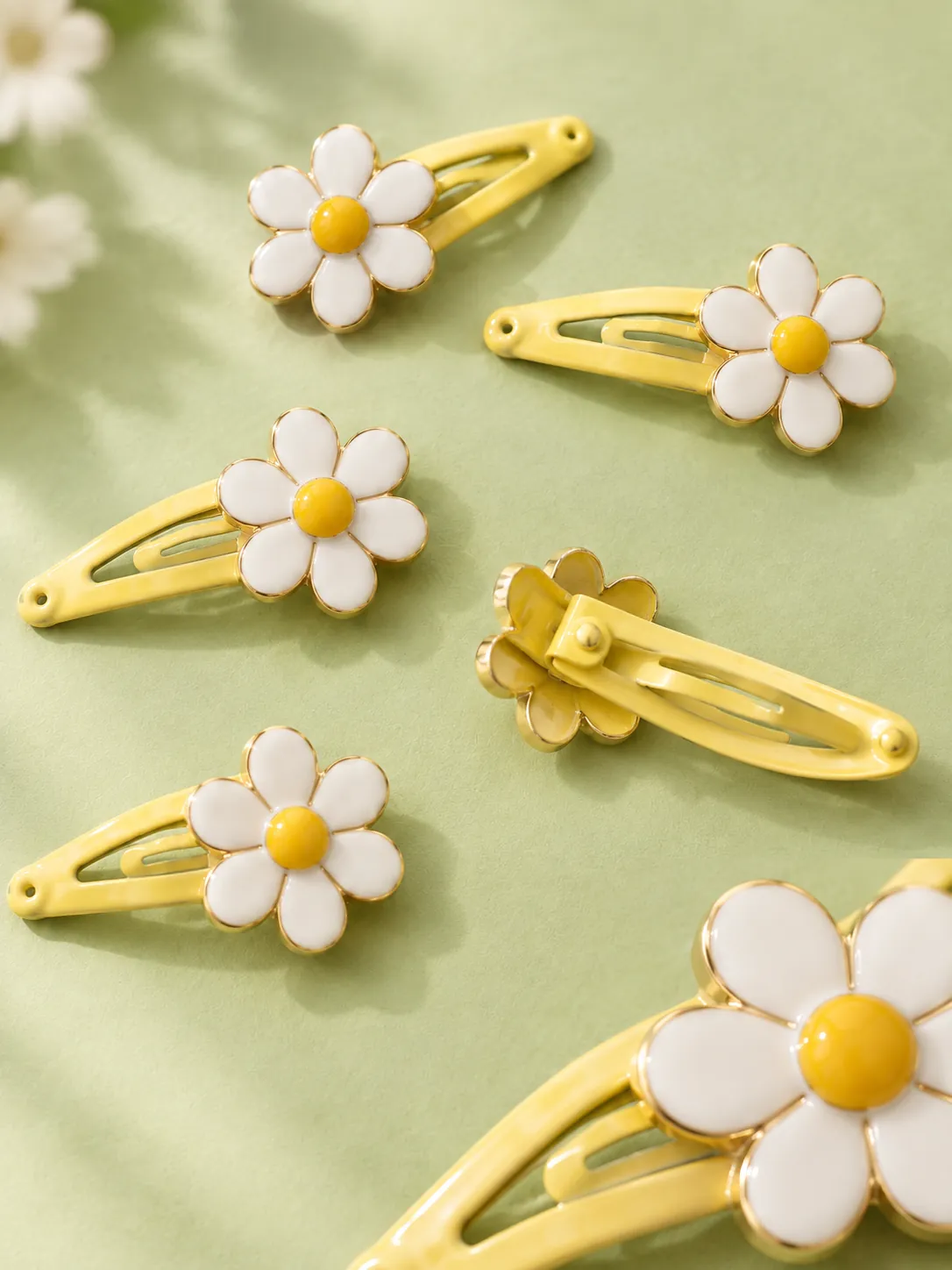 Klikspeldenset Daisy, close-up van structuur en sluiting