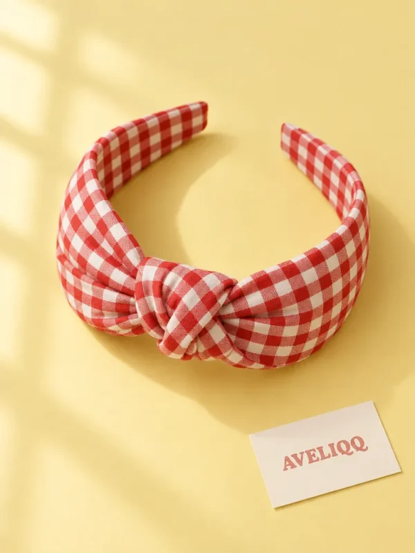 Gingham Minute Headband on a plain coloured background