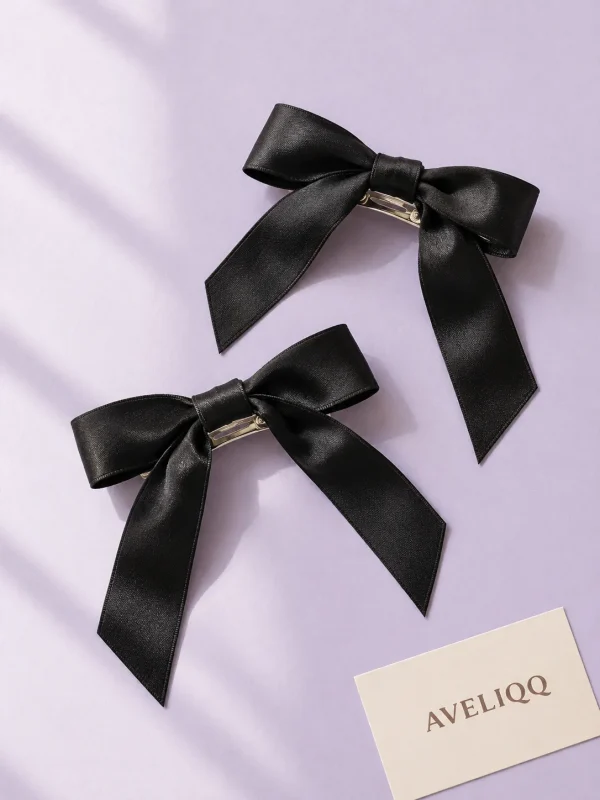 Ribbon Barrette Pair on a plain coloured background