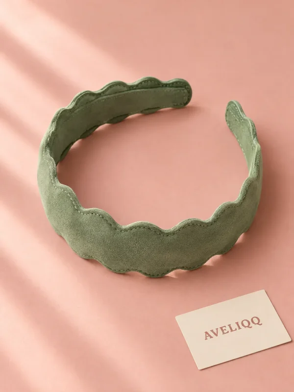 Scallop Edge Headband on a plain coloured background