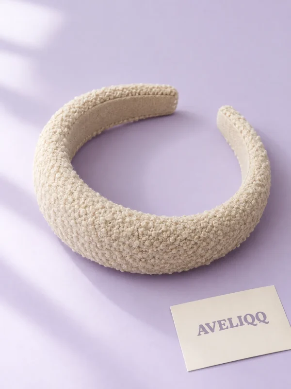 Toast Crumb Bouclé Headband on a plain coloured background