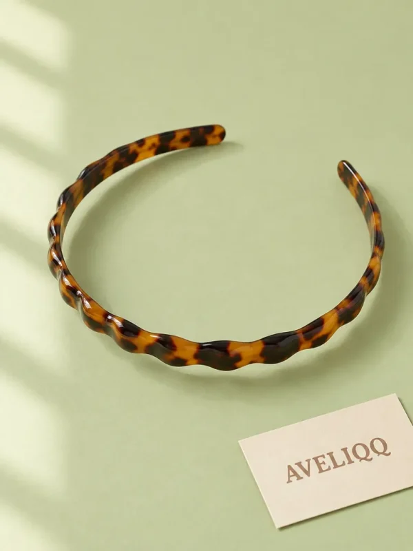 Wave Rib Headband on a plain coloured background